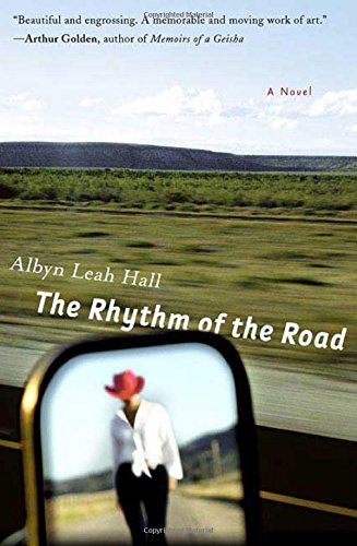 cover image The Rhythm of the Road