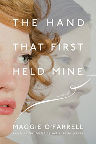 cover image The Hand That First Held Mine