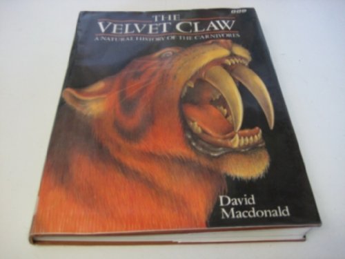 cover image The Velvet Claw: A Natural History of the Carnivores