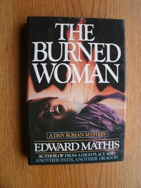 The Burned Woman: A Dan Roman Mystery